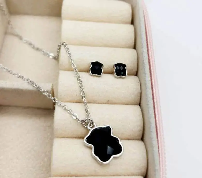 Juego de collar y aretes tous en plata ley