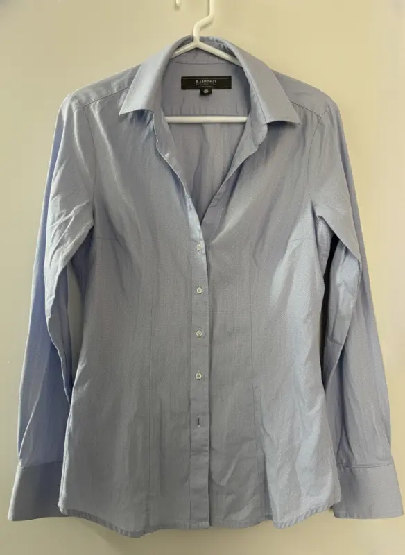 Blusa manga larga celeste marca basement talla S