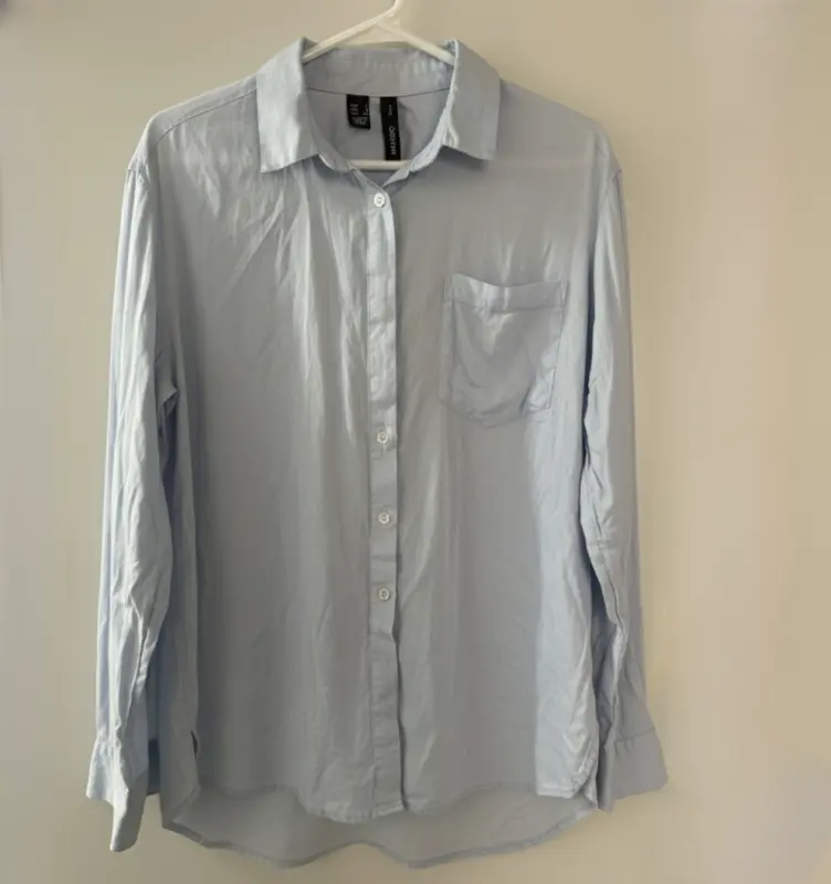 Blusa manga larga celeste marca MANGO talla S